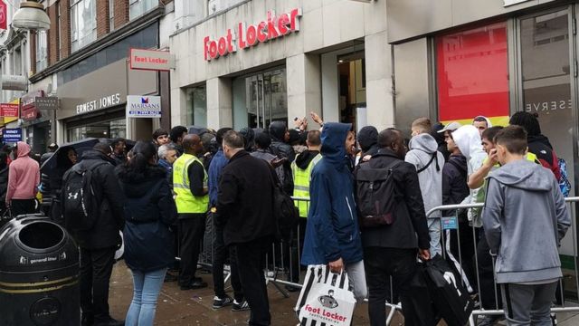 Yeezys: Thousands queue through night for Kanye trainers - BBC News