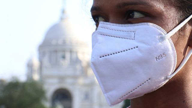 Woman with mask on in Kolkata, India