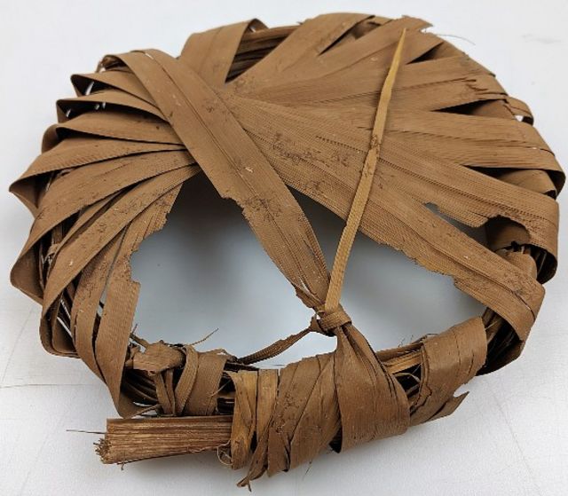 Artefato de folhas de tamareira de 2,1 mil anos
