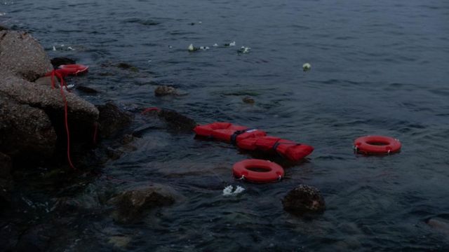 Flotation devices are seen floating in the sea as part of a symbolic demonstration for refugee rights by Greek activists on June 20, 2023