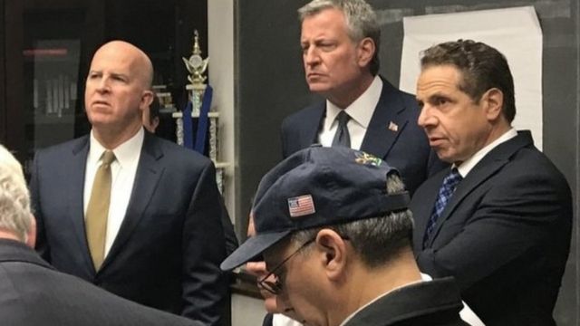 NYPD Commissioner James O'Neill (left), New York City Mayor Bill de Blasio (centre) and New York Governor Andrew Cuomo (right) discuss the incident