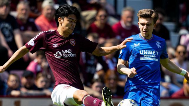 Hearts' Yutaro Oda and Rangers' Ridvan Yilmaz in action during a cinch Premiership match between Heart of Midlothian and Rangers at Tynecastle Park,