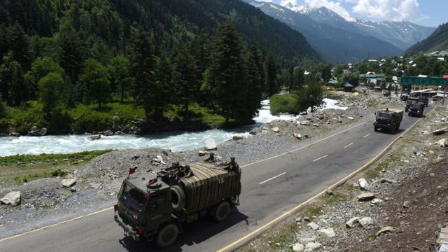 An Indian Army convoy moves along a highway leading to Ladakh, at Gagangeer on June 17, 2020 in Ganderbal, India.