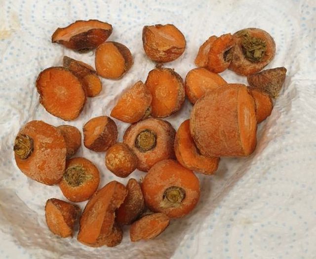Carrots on a kitchen tissue paper