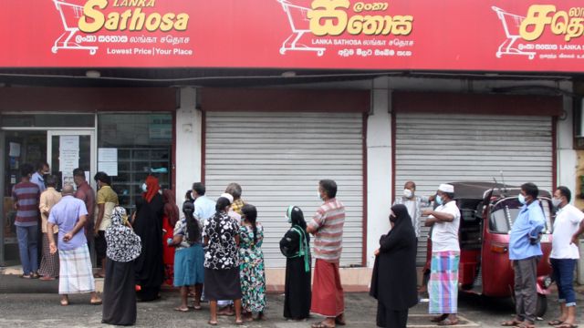 Queue outside state-run supermarket in Colombo