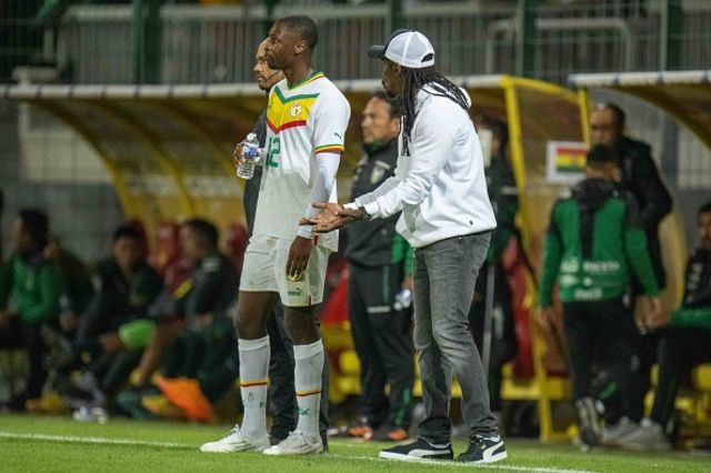 Fodé Ballo-Touré and coach Aliou Cissé of Senegal during the international friendly match between Senegal and Bolivia at Stade Omnisports Source on September 24, 2022 in Orleans, France.