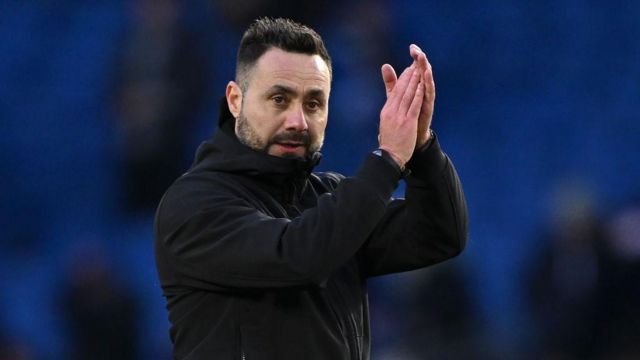 Roberto De Zerbi, Manager of Brighton and Hove Albion, applauds the fans