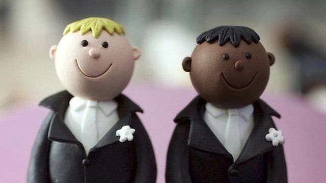 Same sex statues adorn the top of a wedding cake at a wedding specialists store on 5 December 2005, Birmingham, England