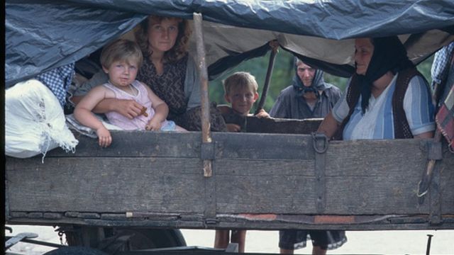 izbeglice na zaprežnom vozilu