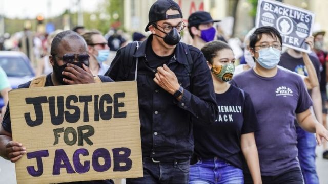 Demonstrators in Kenosha, Wisconsin on Monday 24 August