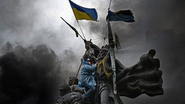 Anti-government protesters, continue to their clash with police in Independence square, despite a truce agreed between the Ukrainian president and opposition leaders on February 20, 2014 in Kiev, Ukraine.