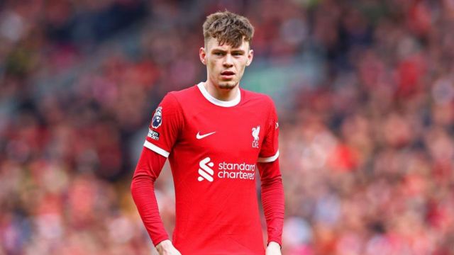 Conor Bradley of Liverpool in action during the Premier League match between Liverpool FC and Brighton & Hove Albion at Anfield on March 31, 2024
