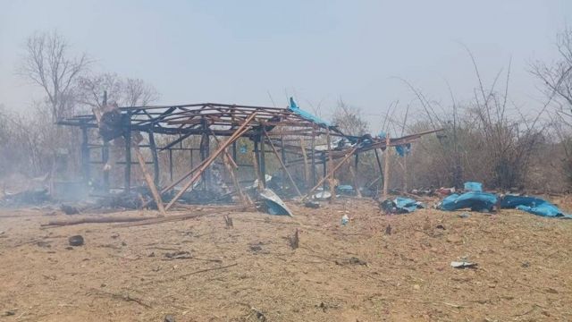 Burnt remains of a civilian structure in Myanmar's Pa Zi Gyi village