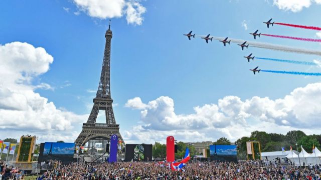 Paris marked the handing over of the Olympic flag with aerial acrobatics.