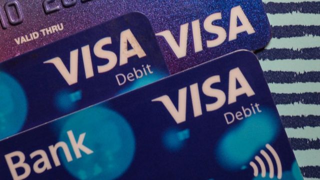 An illustrative image of Visa and Visa debit cards.