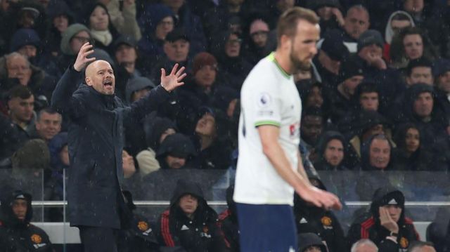Manager Erik ten Hag of Manchester United watches Tottenham striker Harry Kane from the touchline 