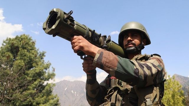 An Indian Army Soldier looks through a 84 MM RL Gun at a Forward Post at LoC Line Of Control in Uri, Baramulla, Jammu and Kashmir, India on 02 April 2022. The Line of Control (LoC) is a military control line between the Indian and Pakistan
