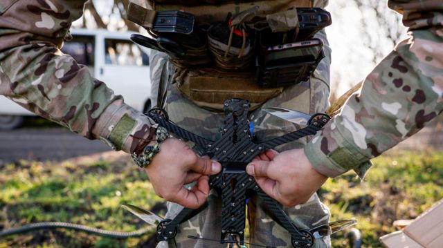 Serviceman of the 80th Airborne Assault Brigade prepares a FPV-drone for launching, in Donetsk region