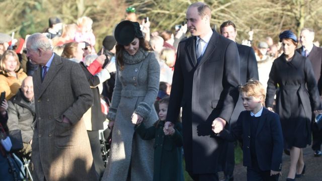 The Prince of Wales with the Duke and Duchess of Cambridge and their children Prince George and Princess Charlotte