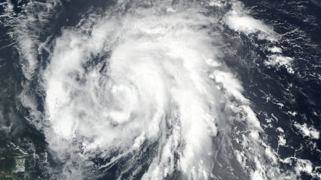 Image shows Hurricane Maria as it approaches the Leeward Islands in the Atlantic Ocean