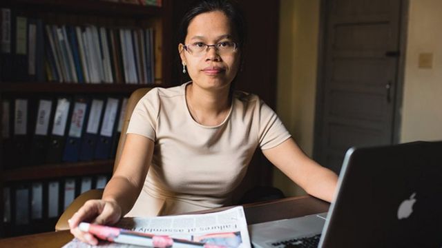 Chak Sopheap director from the Cambodian centre for human rights sits behind her desk