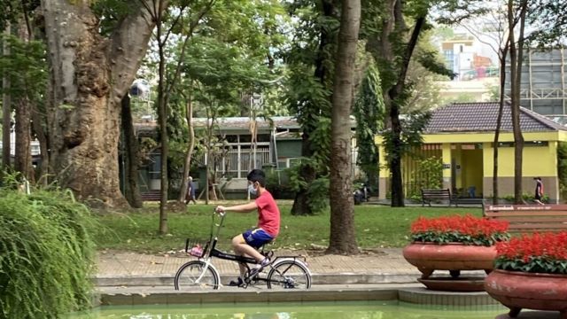 Boy cycling in park