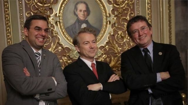 Senator Rand Paul (C) as im pose with im friends from di House during one break