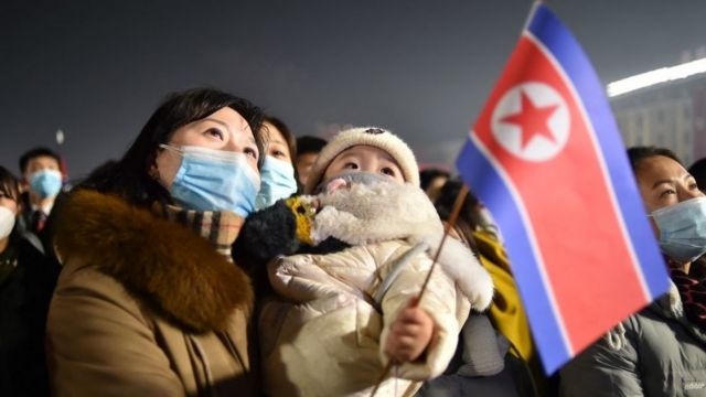 امرأة وطفل في كوريا الشمالية
