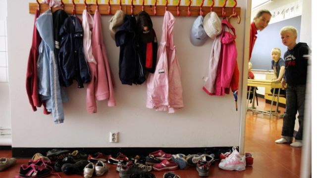 Shoes are left outside the classroom - in Finland as in other Scandinavian countries, pupils attend lessons in their socks or barefoot