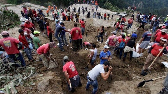 Rescue workers at Guatemala mud slide
