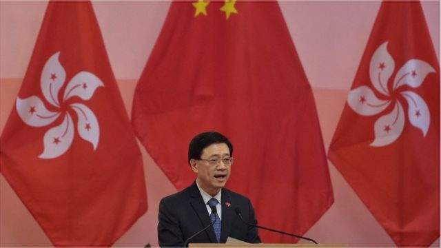 Acting Hong Kong Chief Executive John Lee speaks during a flag-raising ceremony to mark the 24th anniversary of Hong Kong's handover from Britain in Hong Kong on July 1, 2021.