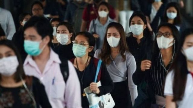 A group of people with masks.