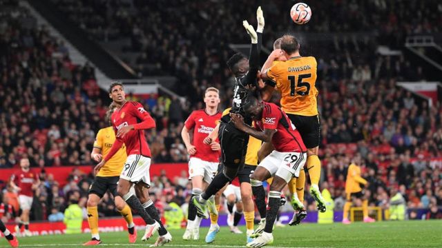 Andre Onana challenges two Wolves players