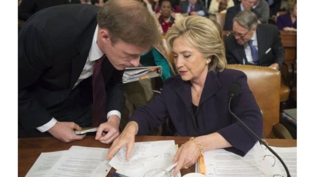 Jake Sullivan with former US Secretary of State Hillary Clinton during a congressional hearing