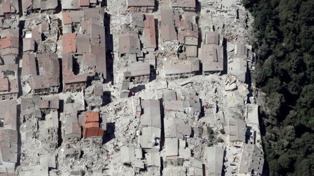 This aerial photo shows the damaged buildings in the town of Amatrice, central Italy, after an earthquake, Wednesday, Aug. 24, 2016