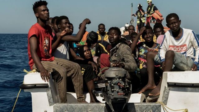 Migrantes em um barco