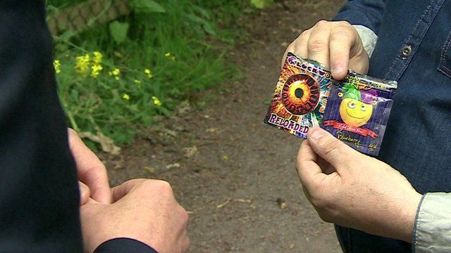 Close up of man holding empty packets of synthetic drugs picked up from the street in Monaghan, Ireland