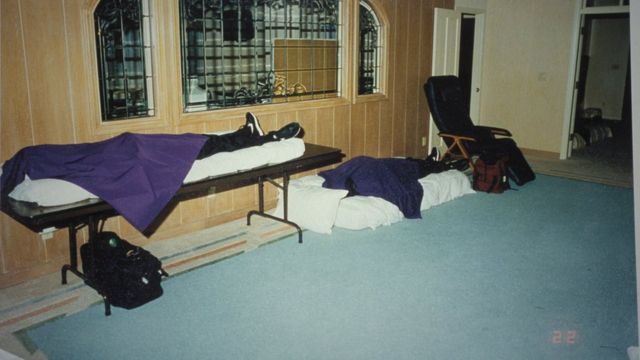 File Photo: San Diego Sheriff's still photo of bodies from the Heaven's Gate cult home where 39 members committed mass suicide. The bodies were found covered with purple shrouds, lying on beds and mattresses in a mansion in Rancho Santa Fe. (Photo by Kim Kulish/Corbis via Getty Images)
