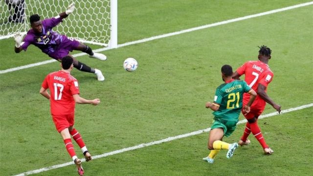 Embolo scoring a goal against Cameroon