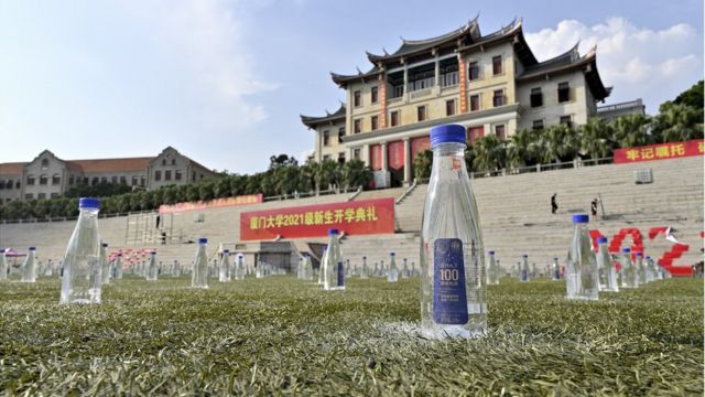 The stadium of Xiamen Univeristy, which should have been occupied by freshmen, is seen with bottled water instead on September 13, 2021 in Xiamen, Fujian Province of China. Affected by the COVID-19 epidemic, Xiamen Univeristy temporarily decides to hold the new semester opening ceremony online.