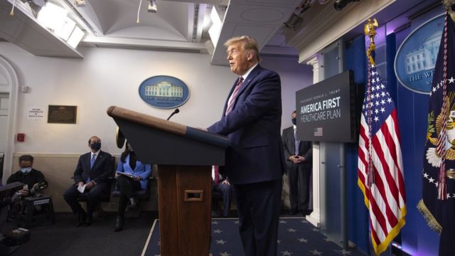 President Donald Trump talks to White House reporters about drug prices