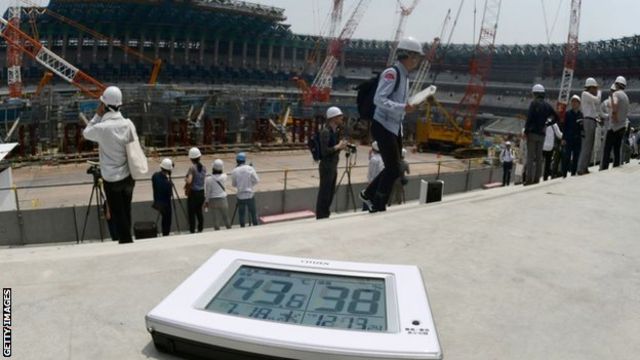 A thermometer shows the temperature at over 40 degrees during a July 2018 media tour at the Japan National Stadium
