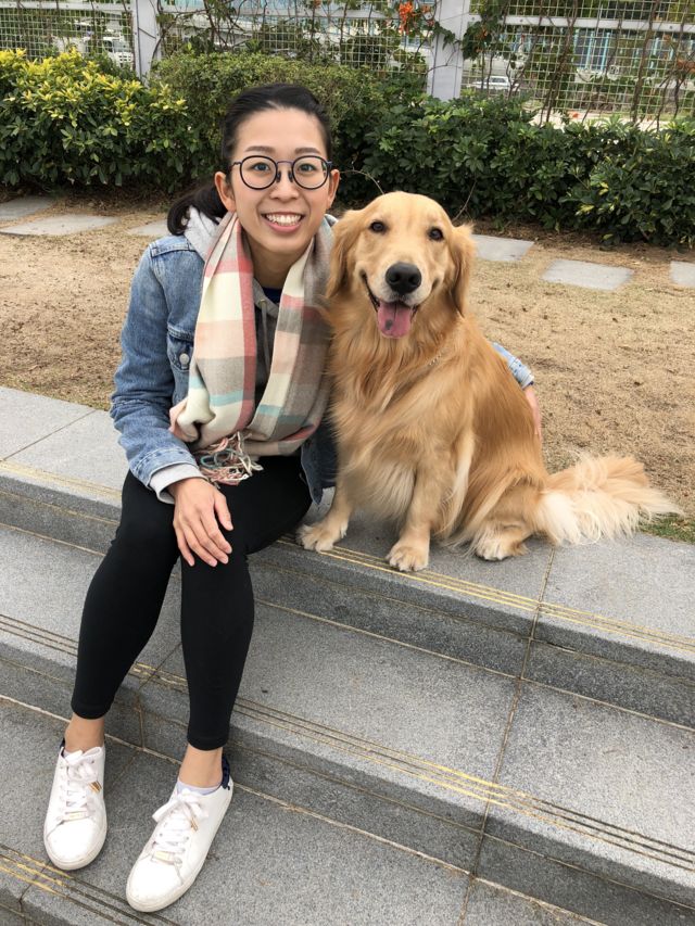 Ng On-yee with her dog "Muffin"