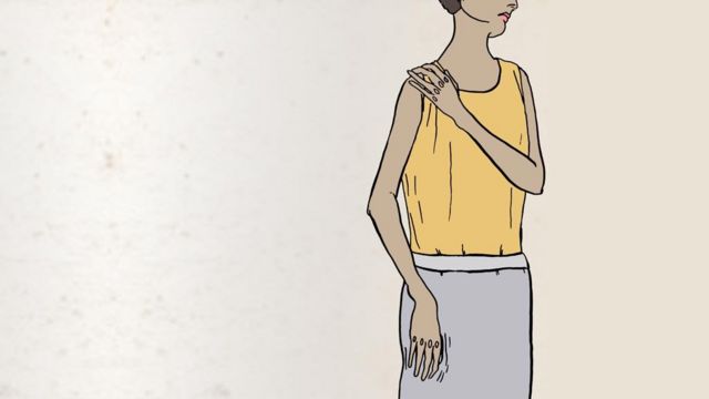 Women holding shoulder