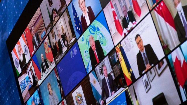 رؤساء دول حول العالم على شاشة خلال قمة افتراضية لتغير المناخ