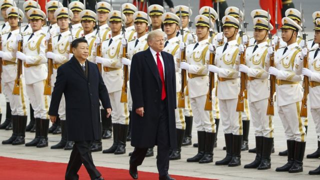 U.S. President Donald Trump takes part in a welcoming ceremony with China's President Xi Jinping on November 9, 2017 in Beijing, China