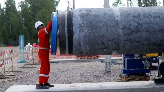 A worker at the construction site of a section of the Nord Stream 2 natural gas pipeline near Kingisepp, Leningrad Region
