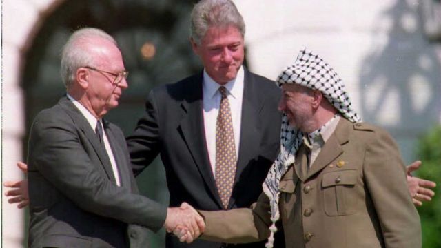 Arafat and Rabin shaking hands in 1993
