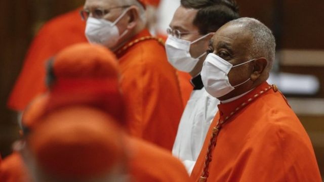 Wilton Gregory wears a face mask after his appointment as a cardinal