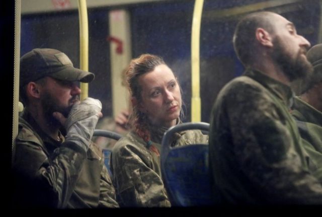 Service members of Ukrainian forces who have surrendered following weeks holed up at Azovstal steel works are seen inside a bus, which arrived under escort of the pro-Russian military at a detention facility in the course of Ukraine-Russia conflict in the settlement of Olenivka in the Donetsk Region, Ukraine May 17, 2022